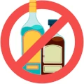 На фото маленький червоний значок заборони, усередині-пляшки з алкоголем, вони перекреслені червоним